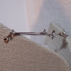 Silver toned butterfly dangle rhinestones earrings clip on